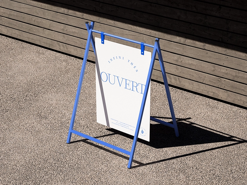 Le 44 identity — Sidewalk sign with Corinthe serif type.